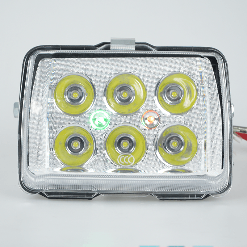 Illuminated view of Wu Yang Series motorcycle 6‑LED headlight, with high‑low beam indicator lights