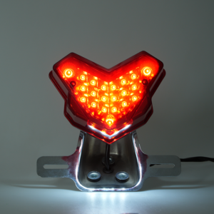 Motorcycle V style LED tail light illuminated, red brake rear light with chrome mounting bracket, lighting demo