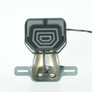 Geometric pattern motorcycle rear LED tail lamp, black smoke cover, chrome mounting holder, front view