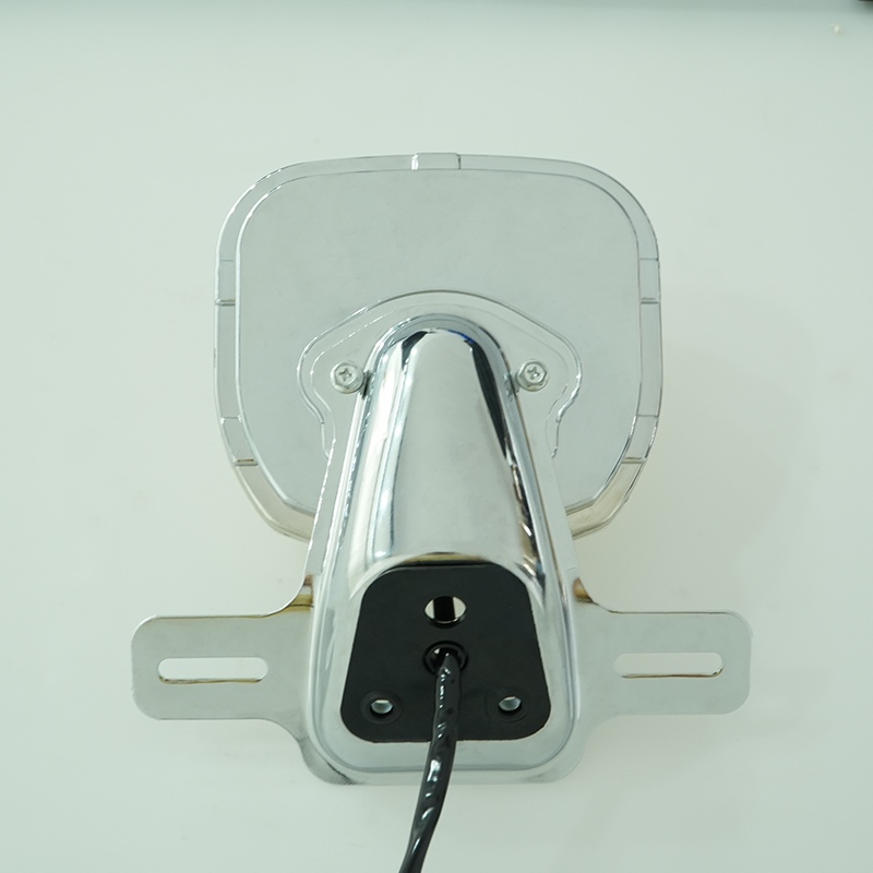 Motorcycle rear tail light back view, polished chrome mounting bracket with wire outlet