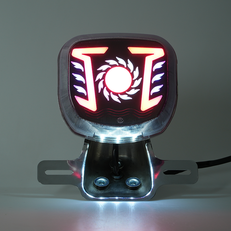 Illuminated motorcycle LED tail light, RGB colorful side decorative strips, sun flame design rear brake light demo