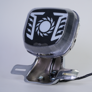 Sun flame pattern motorcycle LED tail light, black smoked inner lens, chrome license plate bracket, blank center circle for custom logo printing, side view