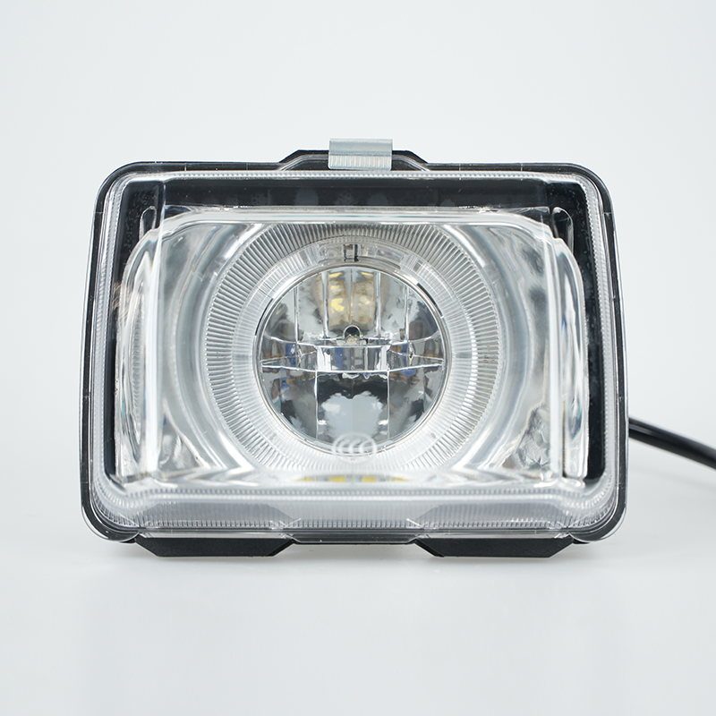 Front view of square motorcycle LED headlamp with transparent glass cover, power‑off status