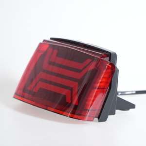 Side‑view red lens motorcycle modified LED tail light with geometric stripe pattern, power‑off state