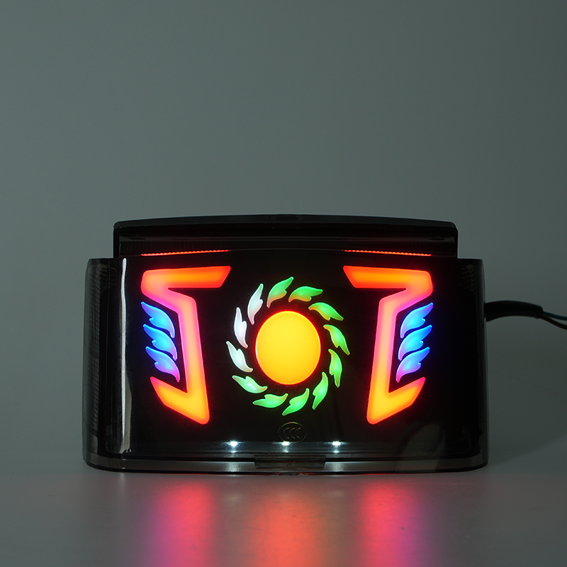 Illuminated RGB motorcycle tail lamp with customizable logo space