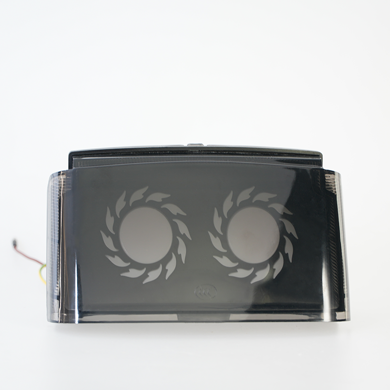 Smoke cover motorcycle modified LED tail light, dual customizable logo zones, power‑off front view